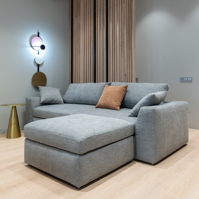 Photo of a grey fabric corner sofa