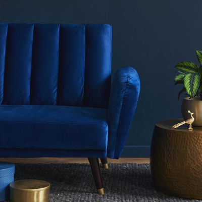 Photo of a blue velvet sofa