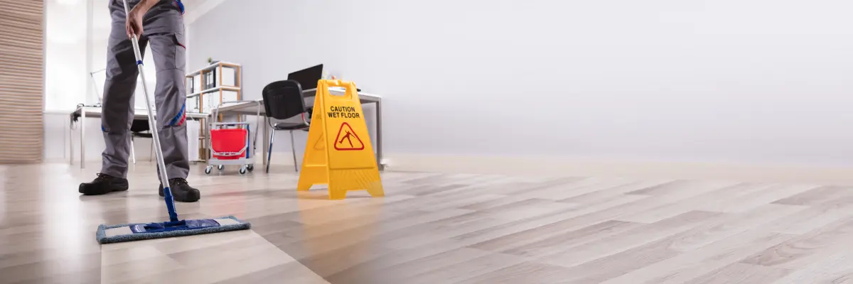 Man cleaning a floor