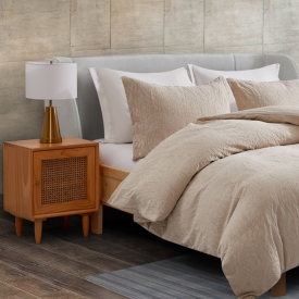 Photo of a bed with plush pillows