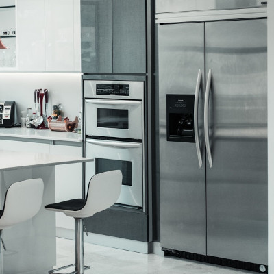 Kitchen with oven and fridge
