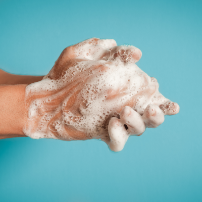 Soapy hand being rubbed together