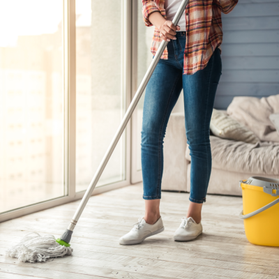 Young woman mopping