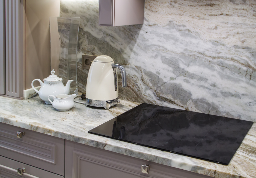 Ceramic hob in a grey kitchen