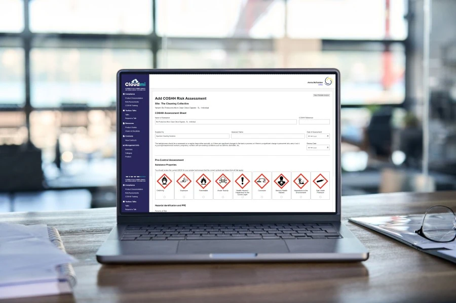 Cloud MI risk assessment template on a laptop