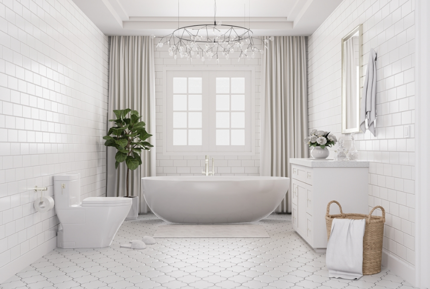 Bathroom fully tiled with white tiles