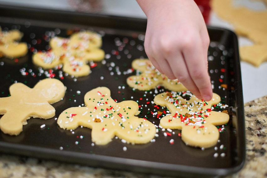 Child baking biscuits