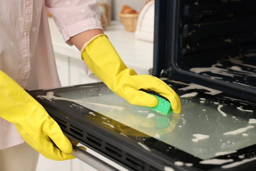 Lady cleaning glass