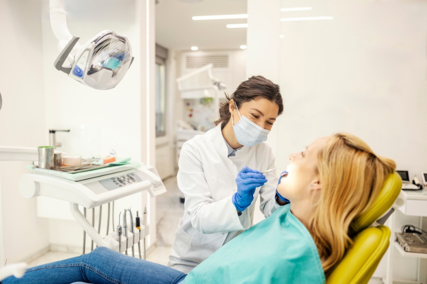 Dentist completing a surgery