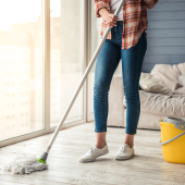 Woman mopping floor