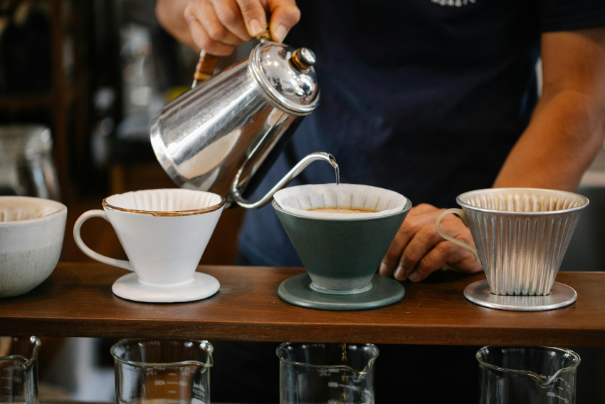 Pouring kettle into a coffee filter