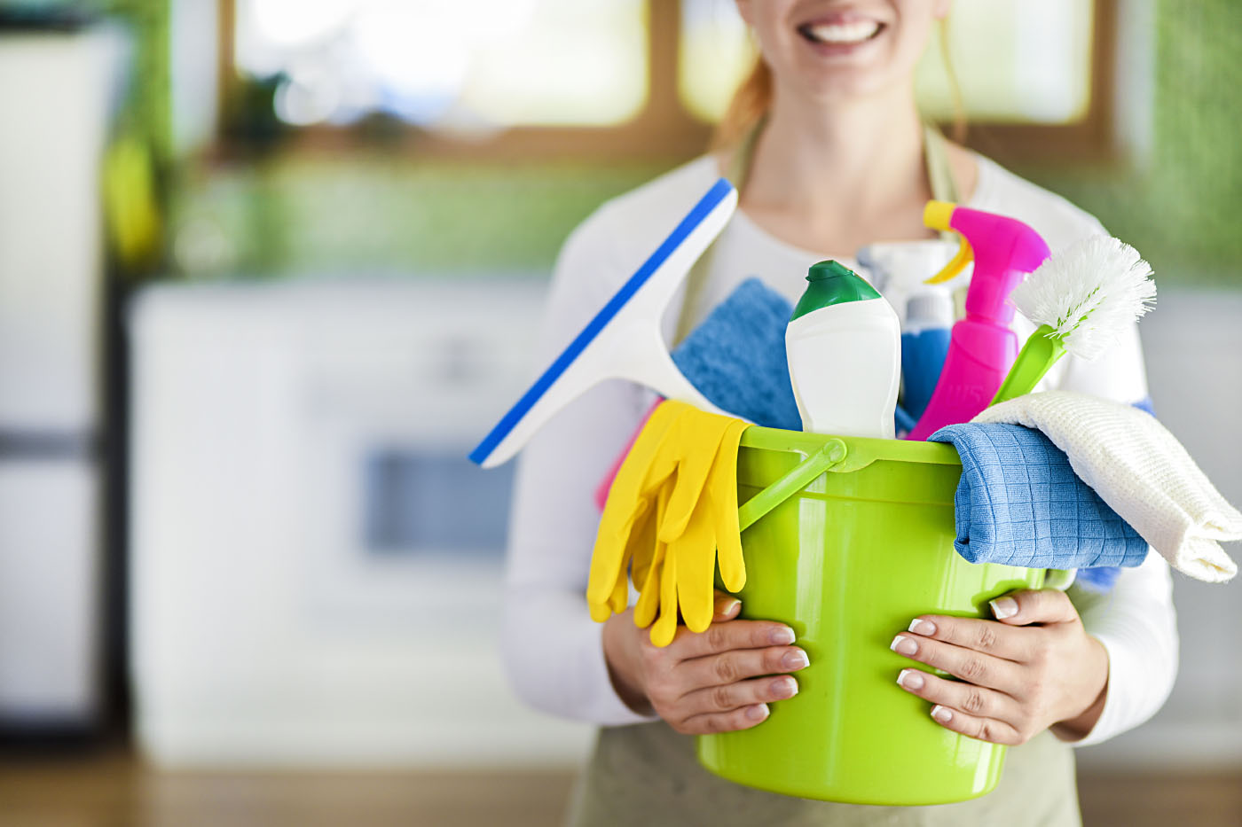 Bucket containing cleaning supplies